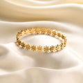 Bloom Charm Stainless Steel Flower Bangle – Timeless Elegance