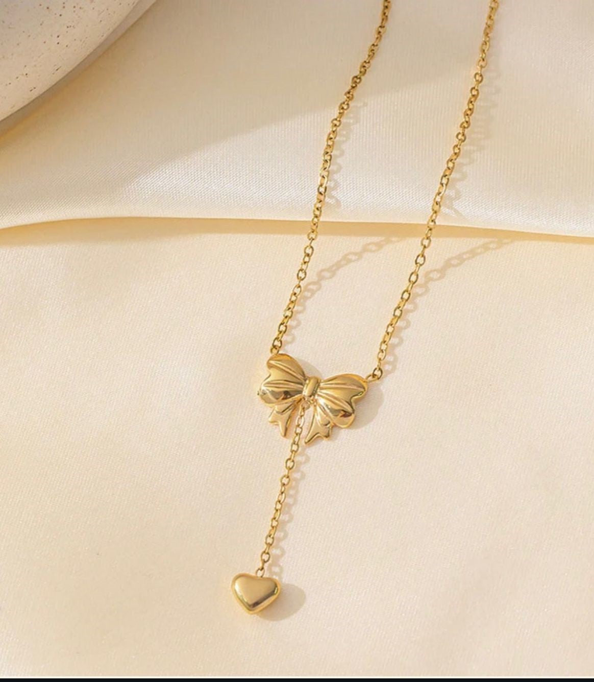 Stainless Steel Bow Heart Necklace – Elegant & Trendy