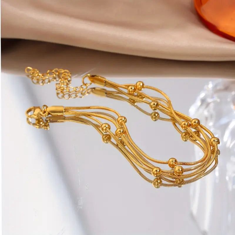 TRIPLE BALL BRACELET STAINLESS STEEL GOLDEN COLOR